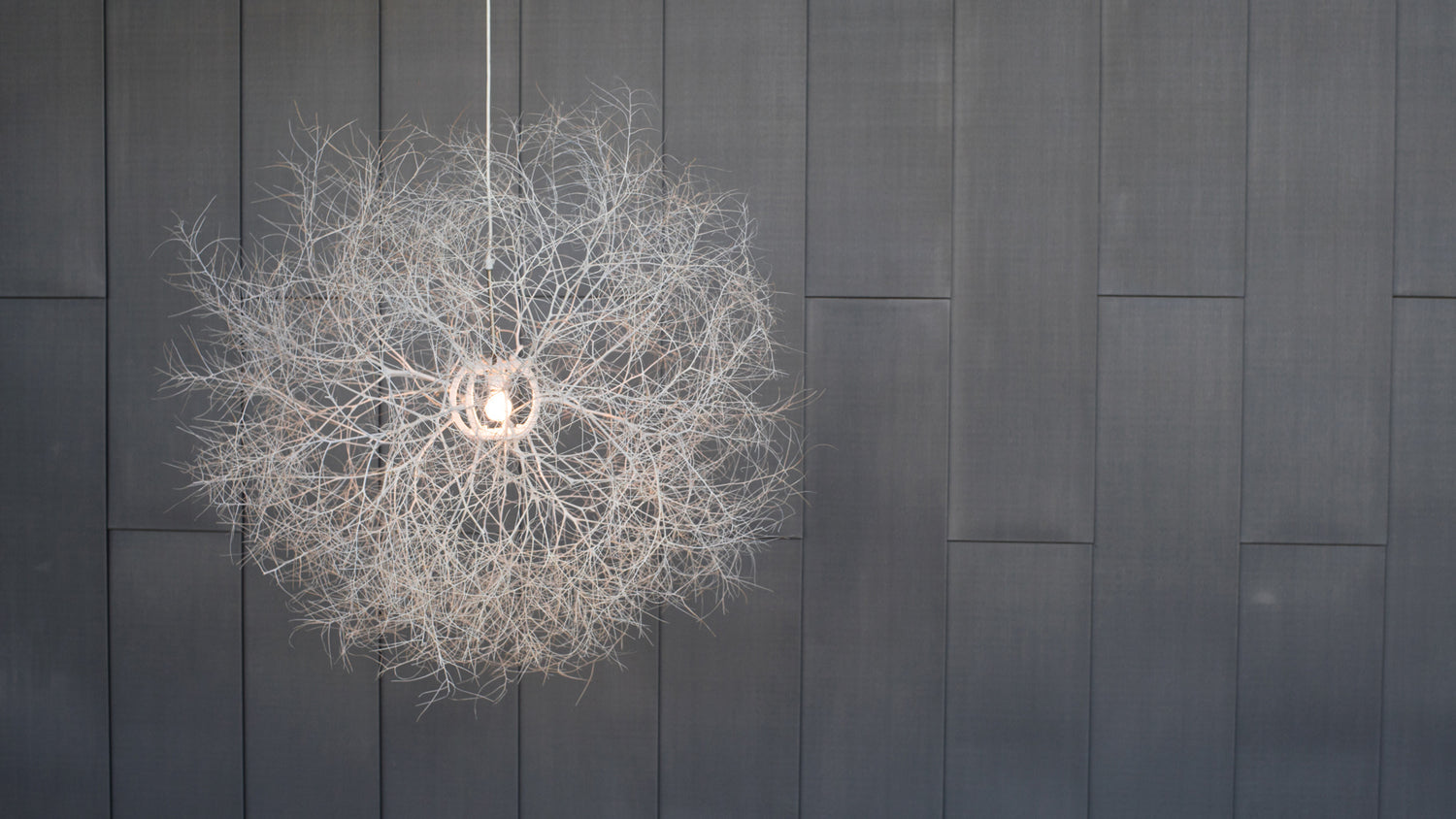 This tumbleweed chandelier is made of actual tumbleweeds and is as much hanging sculpture as it is a light pendant.